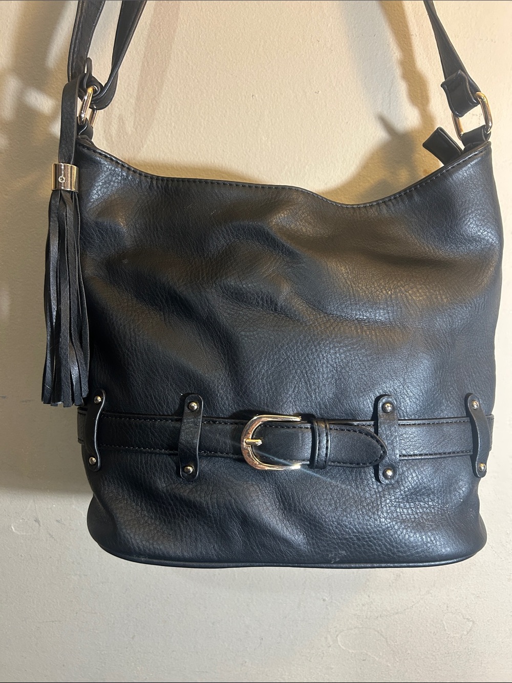 Classic Black Leather Shoulder Bag with Tassel Detail